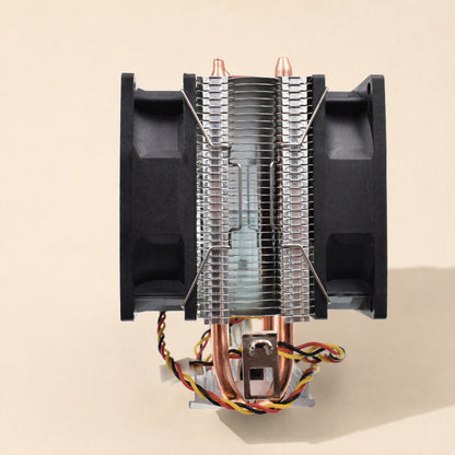 Fanclip – Front view of a twin-fan CPU radiator with copper heat pipes and steel clips fastened at the fan edges