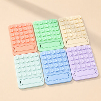 Suctionstay – Six pastel suction cup phone holders in orange, green, cream, mint, blue and lavender