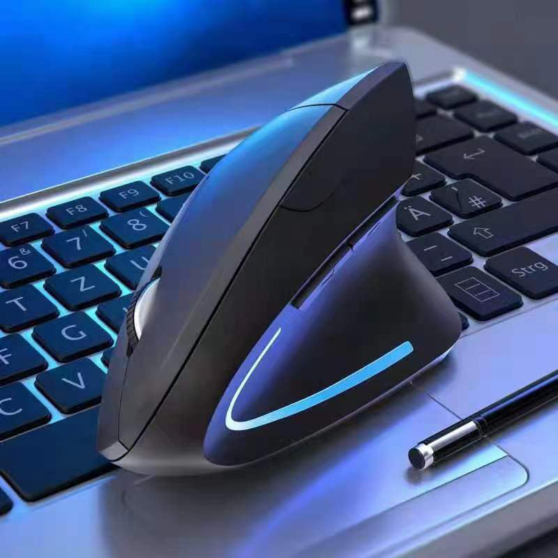 Upright – Close-up of the black vertical mouse with blue light strip resting on a backlit laptop keyboard