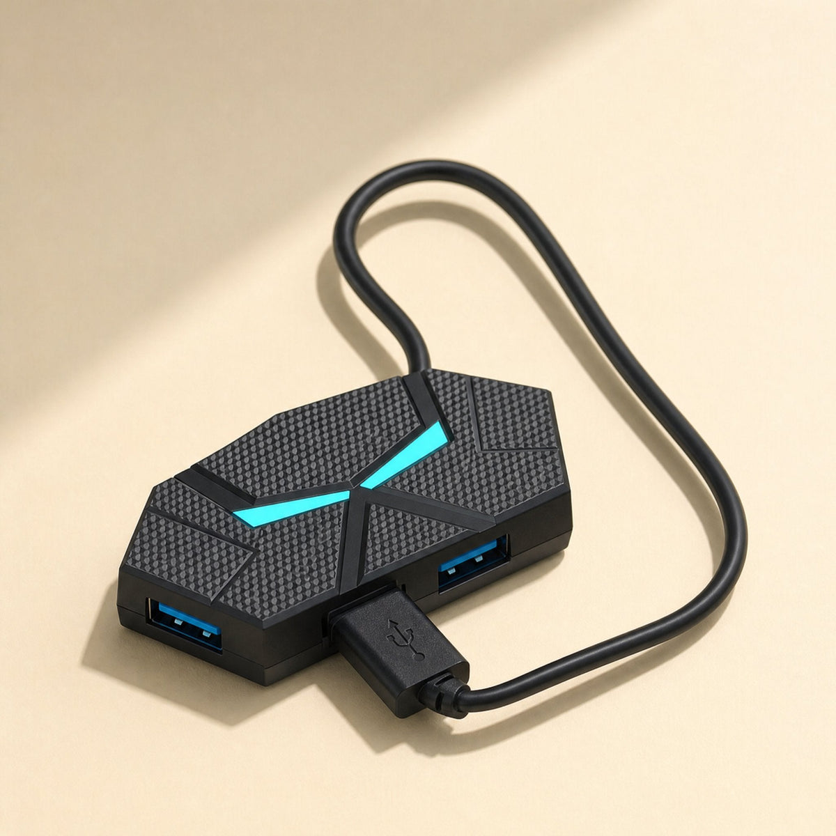 Glowbranch – Hub with cyan light lying flat, cable looped behind it and a plug inserted in the front of one USB port