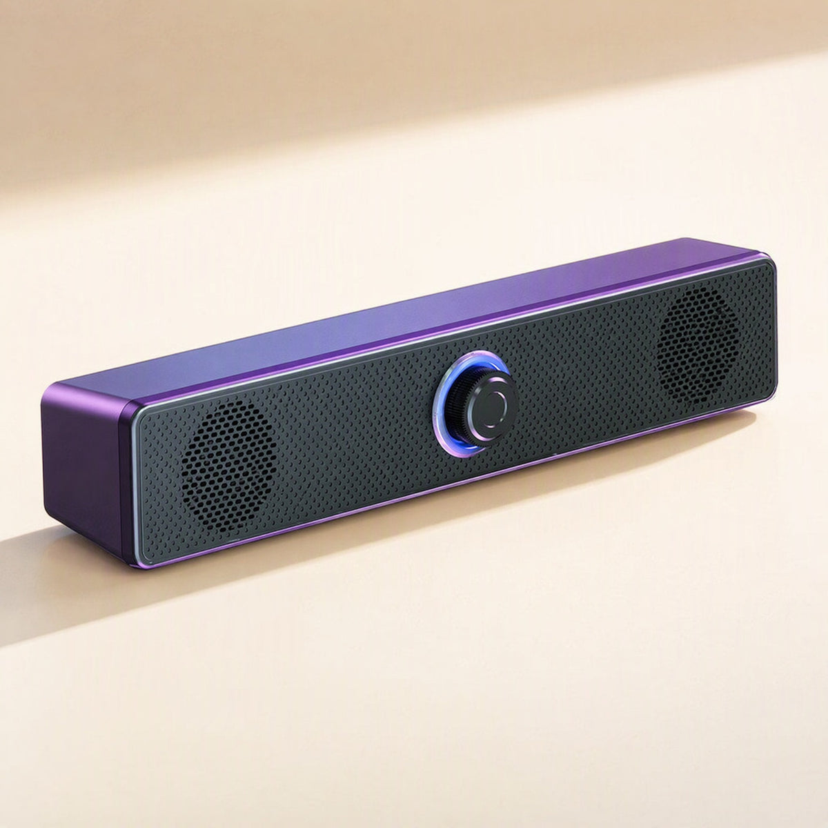 Soundbit – Purple soundbar speaker with a glowing blue-violet ring around the center knob, shown at a three-quarter angle