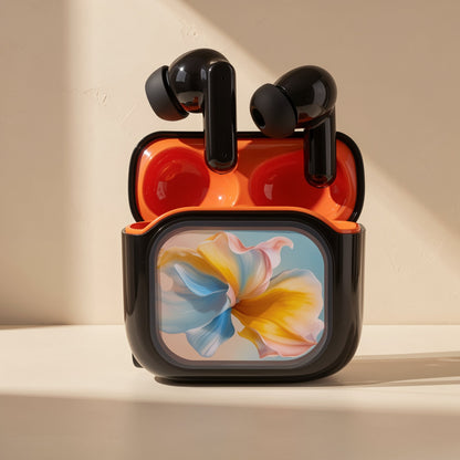 Quietwave – Close-up of black earbuds resting in the open orange case with a blue and yellow petal design on the front