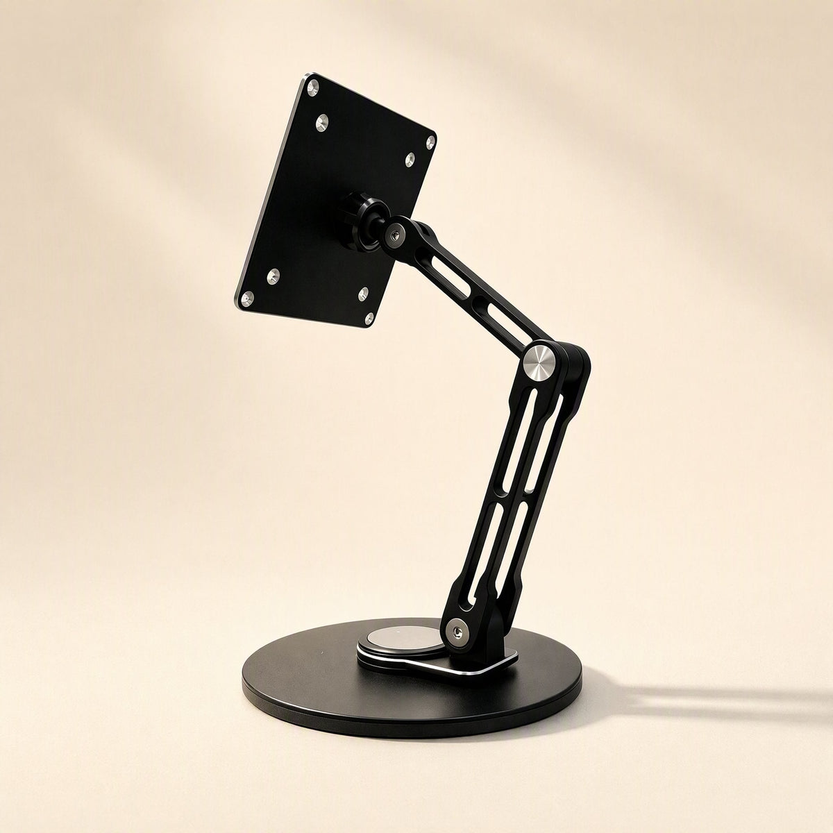 Swiveldesk – Rear angle of the black stand showing the slotted aluminum arm and mounting plate with screws