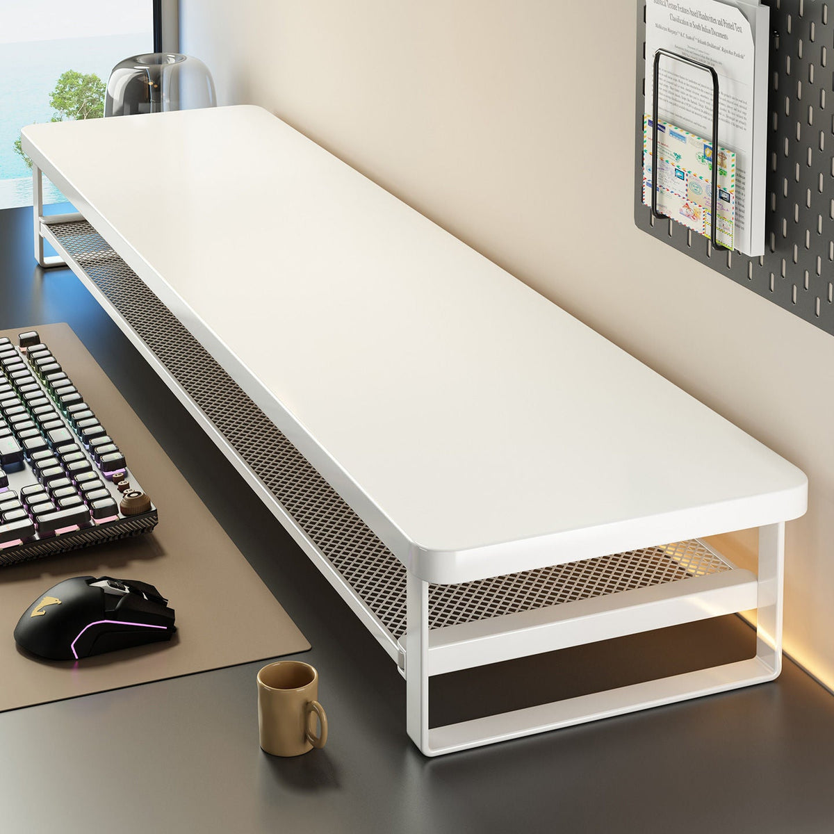 Oakdrawer – White desk shelf with mesh underside and white metal frame, angled view beside a keyboard and mouse