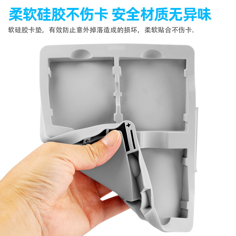 Hand bending the gray silicone cartridge insert of the Cartloft storage box, with Chinese text above