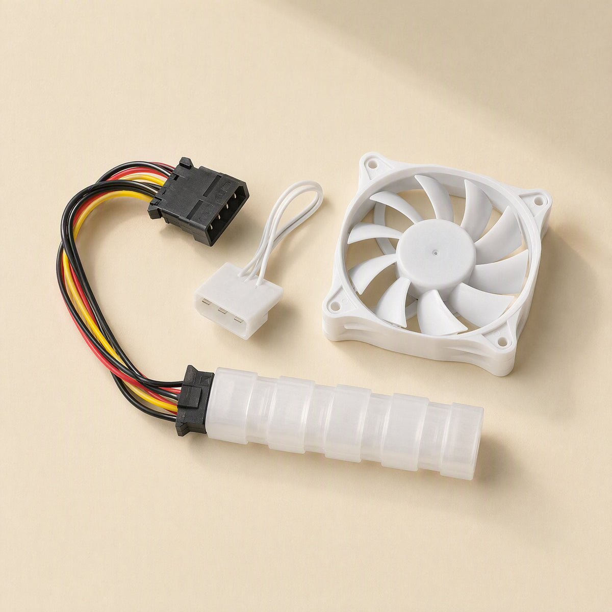Pinwheel – White fan with a 4-pin power cable, a Molex adapter and a clear sleeve laid out on a beige surface