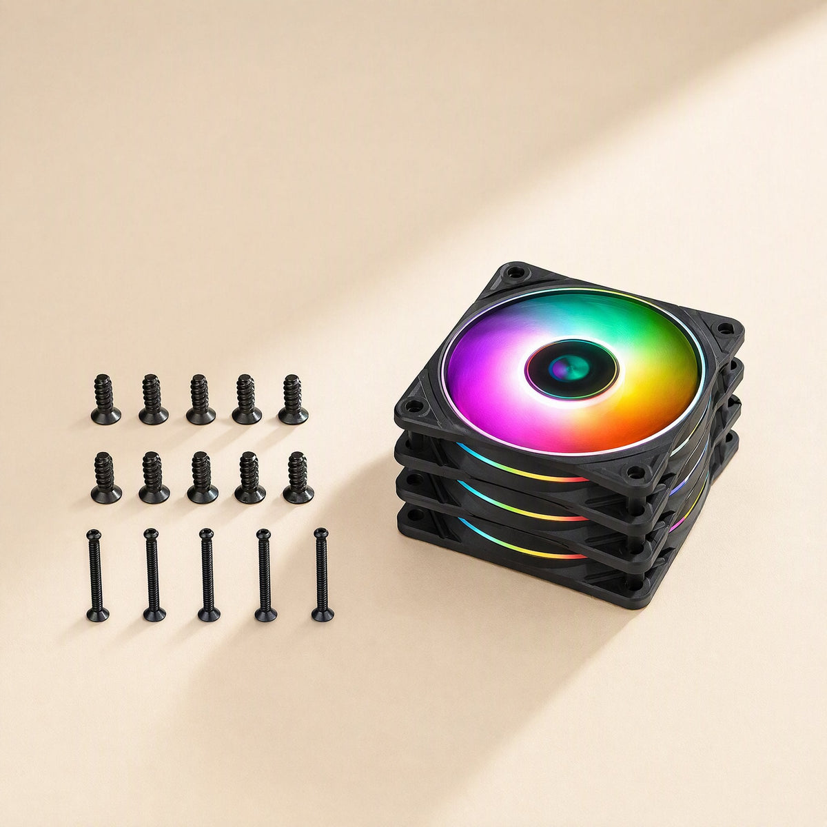 Pinwheel – Stack of four black RGB fans beside two rows of black screws and a row of long mounting pins