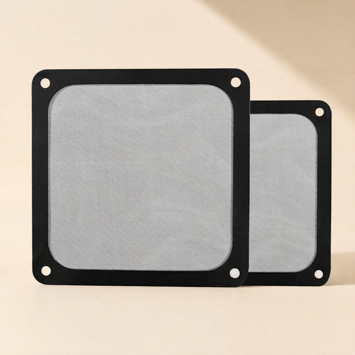 Dustflow PVC Magnetic Fan Dust Filter in black, two sizes stacked on a cream background