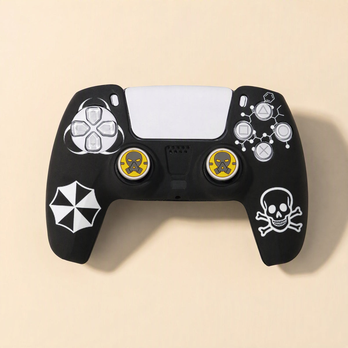 Spookshield – Black PS5 controller cover with white umbrella, skull and molecule designs and yellow gas mask thumbstick caps