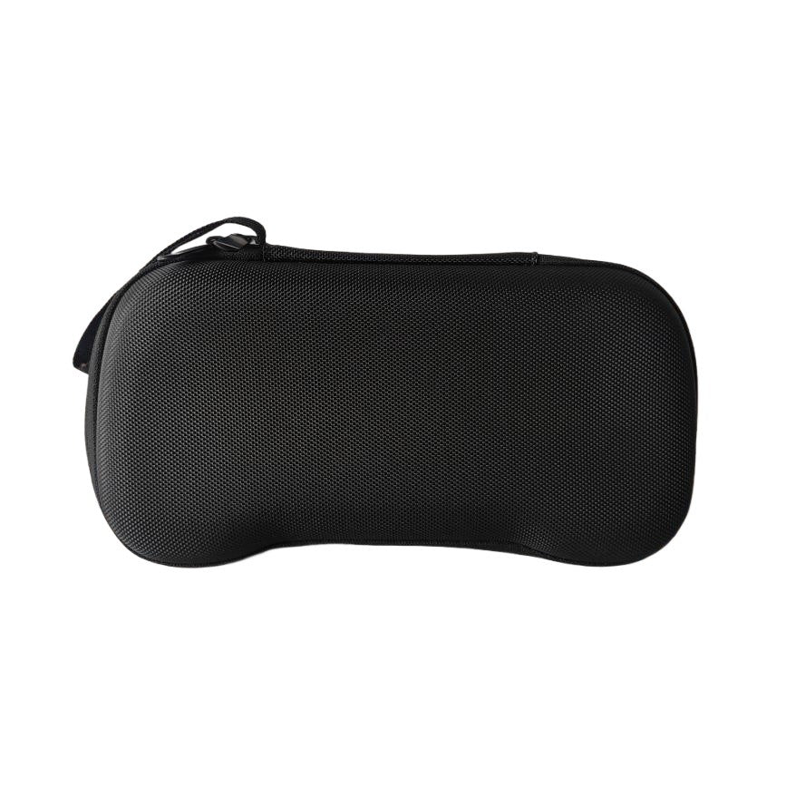 Pockette – Closed black case lying flat, front view showing the curved shape and zipper pull