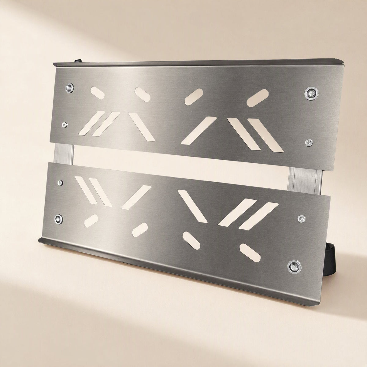 Towerhold – Stainless steel bracket shown standing on its side, slotted panels with two adjustable cross rails visible