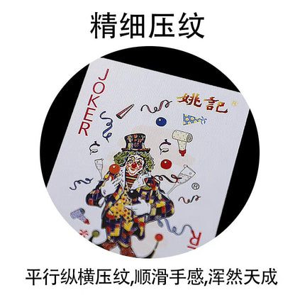 Suitfold – Close-up of a Joker card showing a juggling clown illustration with fine embossed texture and Yaoji logo