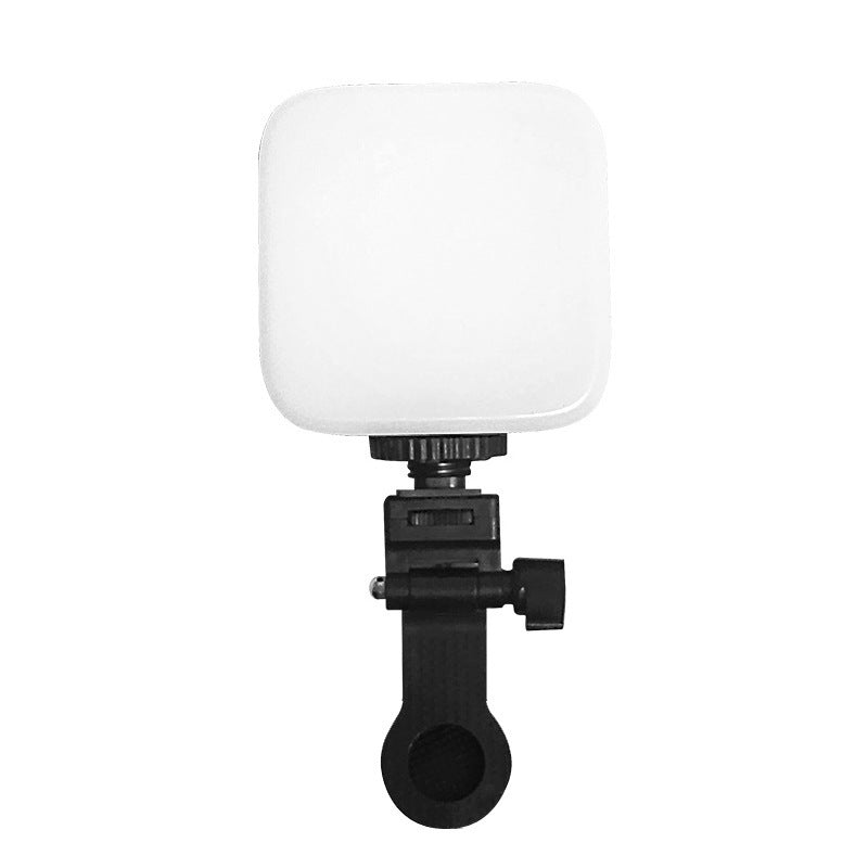 Pocketbeam – Square white LED fill light front view on a black swivel clamp mount against a plain white background