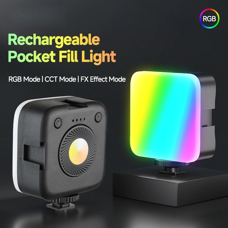 Selfbeam RGB Pocket LED Phone Fill Light shown front and back, glowing in rainbow colors on a dark background