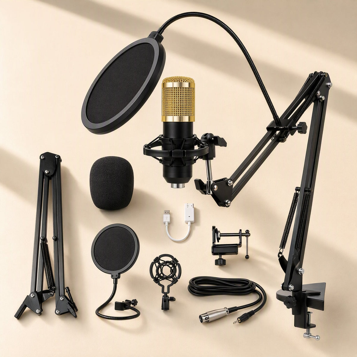 Voxblend Condenser Mic Set with gold mic, boom arm, pop filter, shock mount, foam cover and cables on beige