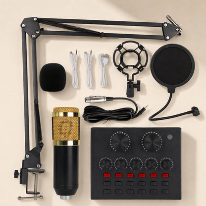 Soundloom condenser microphone kit flat lay with boom arm, sound card, cables, shock mount and pop filter