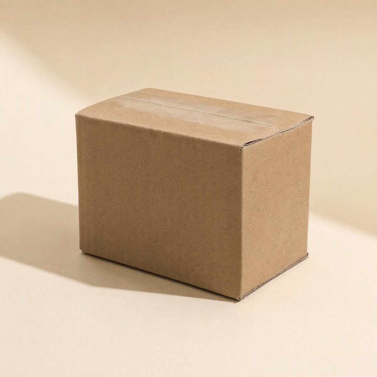 Earsoft Soho Headphone Ear Pad Covers – plain brown cardboard shipping box on a cream background