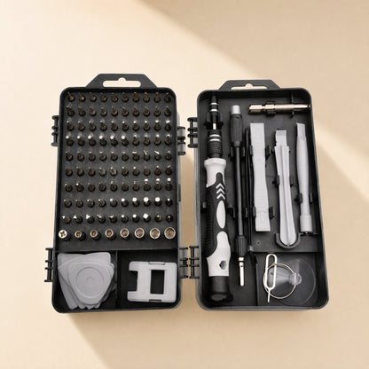 Bitnest 115-in-1 Screwdriver Tool Set open flat, bit grid on left and handle with pry tools on right