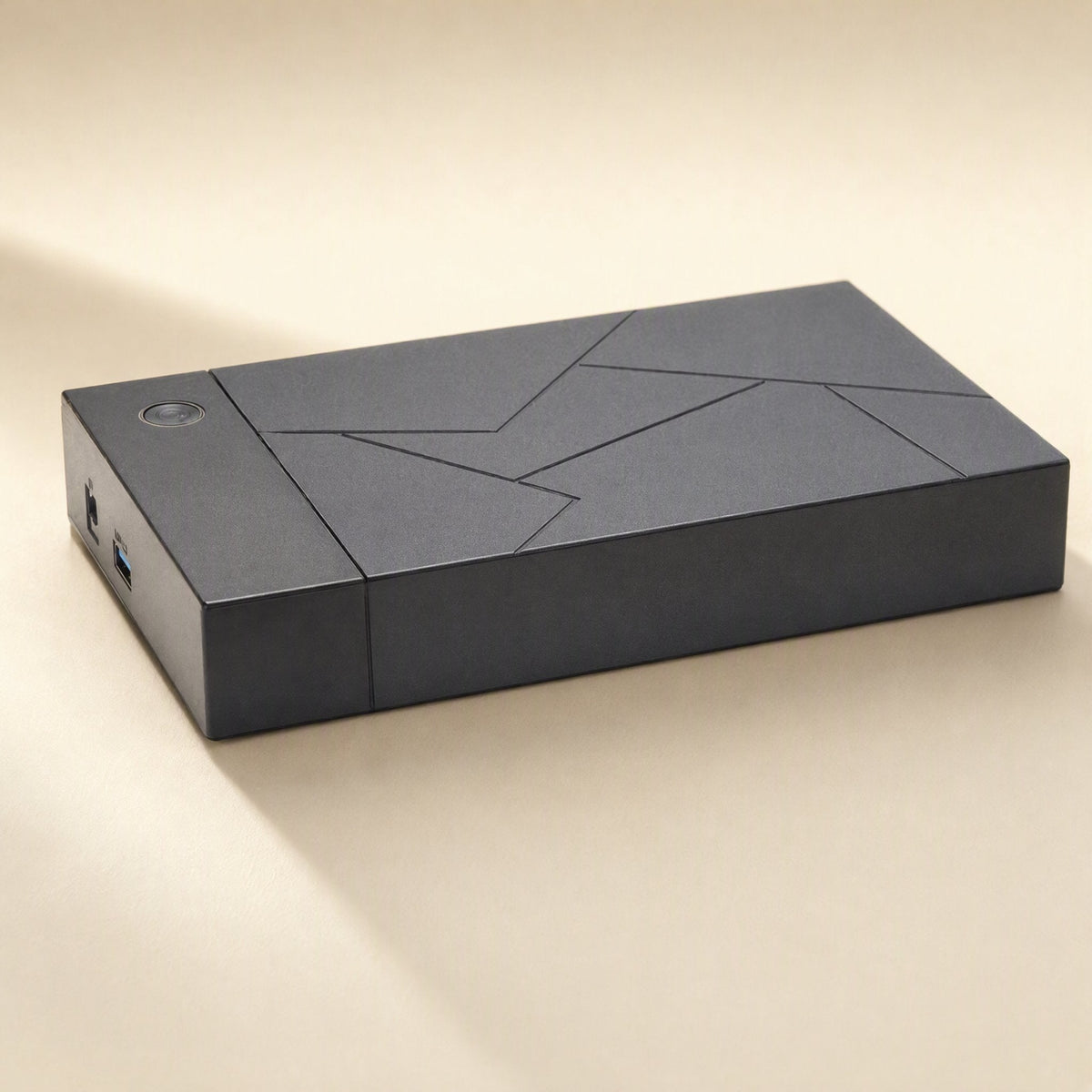 Diskshield 3.5-Inch USB 3.0 Hard Drive Enclosure in black with a geometric line pattern, seen from a front angle