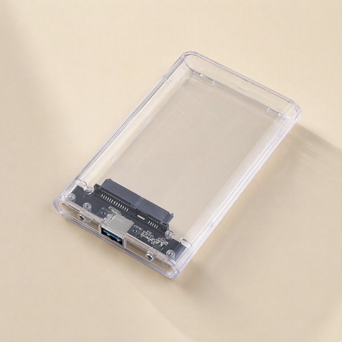 Diskshield – Clear transparent drive enclosure showing the internal circuit board, SATA connector and USB port