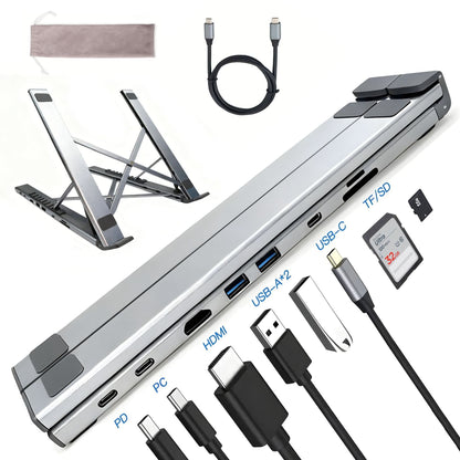 Dockspan – Gray aluminum docking stand folded flat, with USB-C cable, storage pouch, SD card and connector plugs shown