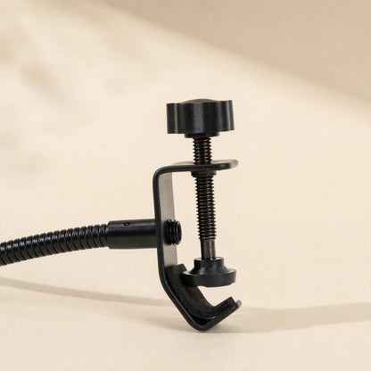 Popcatch Microphone Pop Filter – close-up of the black C-clamp with thumbscrew and gooseneck joint on a cream background