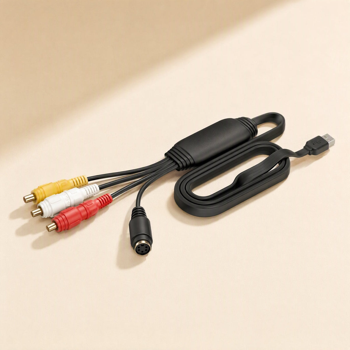 Signalgrab – Capture adapter seen from the RCA end, showing gold-tipped yellow, white and red plugs and the S-Video port