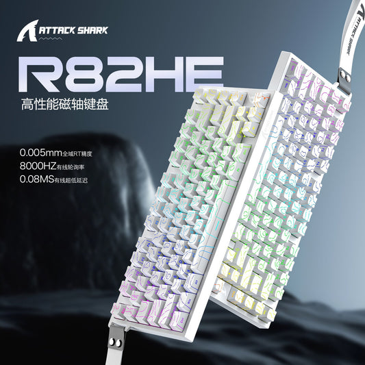 Magkey – Two white keyboards with topographic keycaps and RGB lighting shown at an angle against a dark rocky backdrop