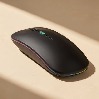 Roamclick – Matte black wireless mouse from above, showing the scroll wheel, small indicator light and rainbow edge glow