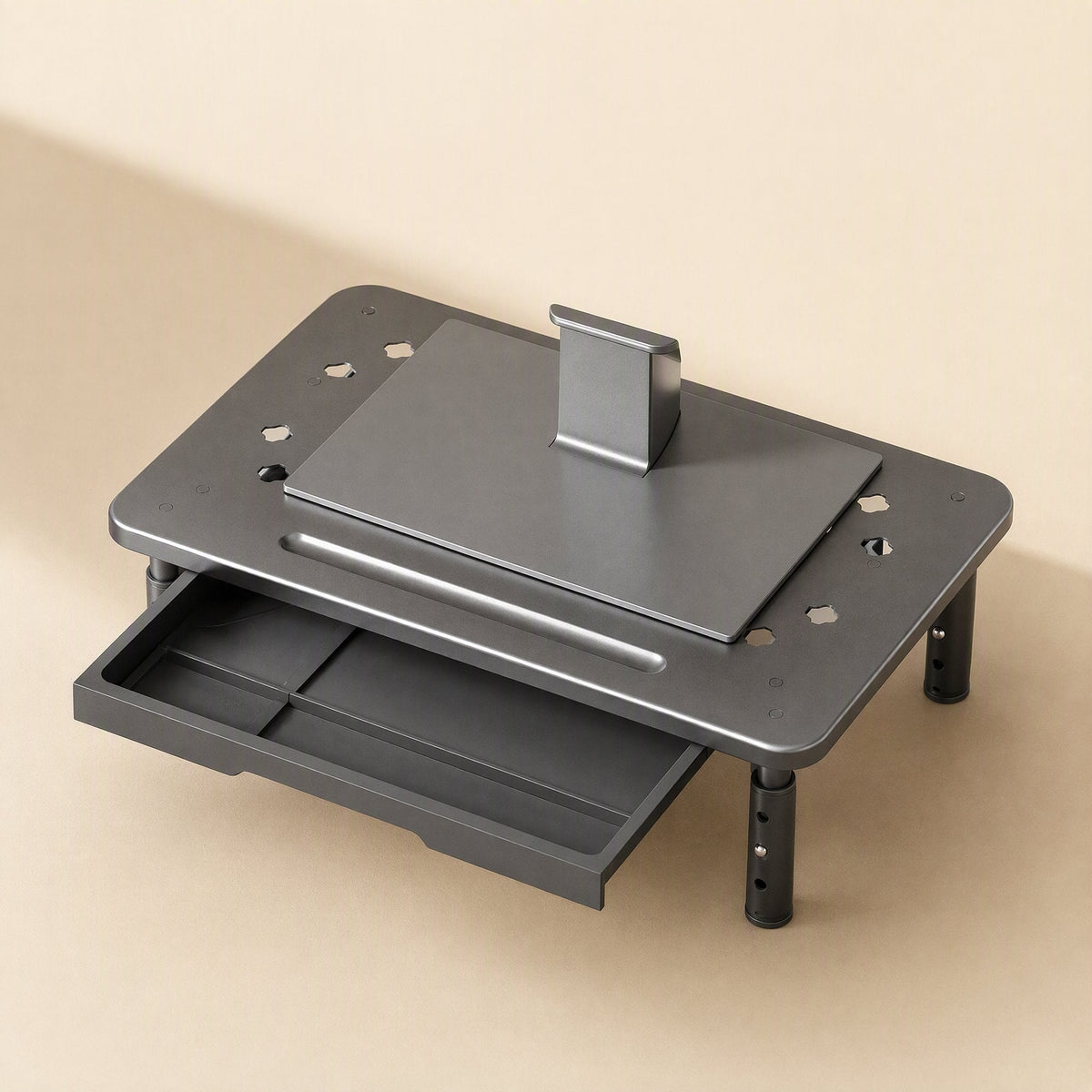 Risecrest Aluminum Alloy Monitor Riser in gray with a laptop and stand on top and a pull-out drawer
