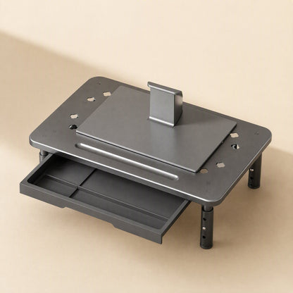 Risecrest Aluminum Alloy Monitor Riser in gray with a laptop and stand on top and a pull-out drawer
