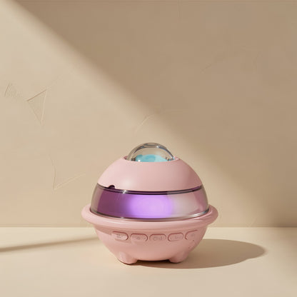 Glowchord Bluetooth Speaker in pink with a glowing purple band and dome light on a cream shelf